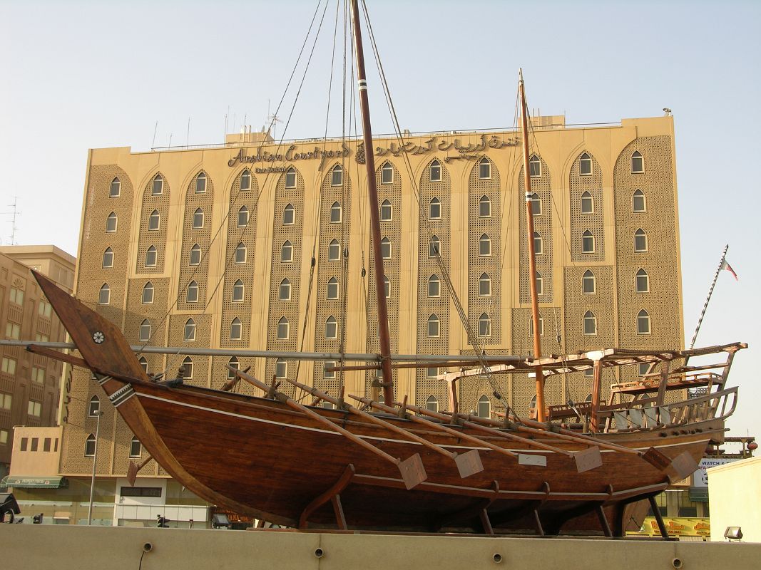 Dubai 01 03 Arabian Courtyard Hotel Outside With Dubai Museum Dhow